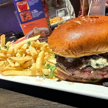 Dave & Buster's Orlando - Limited burger with blue cheese, pork belly, caramelized onions - American Near Me - Orlando, Florida Dave & Buster's Orlando - Limited burger with blue cheese, pork belly, caramelized onions - American Near Me - Orlando, Florida
