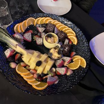 Deluxe Fun Dining - Fruit platter - Bars Near Me - Charlotte, North Carolina Deluxe Fun Dining - Fruit platter - Bars Near Me - Charlotte, North Carolina