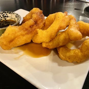 Limo Peruvian Eatery - Picarones A Peruvian Classic Fried Sweet potato Donuts covered in Fruit infused Honey (from fig) - Peruvian Near Me - Nashville, Tennessee Limo Peruvian Eatery - Picarones A Peruvian Classic Fried Sweet potato Donuts covered in Fruit infused Honey (from fig) - Peruvian Near Me - Nashville, Tennessee