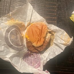 a hamburger and fries on a table a hamburger and fries on a table