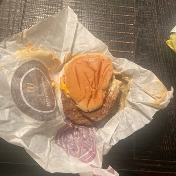 McDonald's - a hamburger and fries on a table - Fast Food Near Me - Findlay, Ohio McDonald's - a hamburger and fries on a table - Fast Food Near Me - Findlay, Ohio