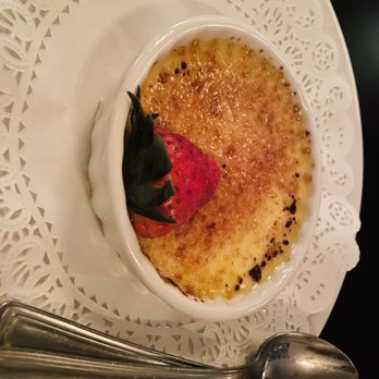 Owen Brennan's - a bowl of creme with a strawberry on top - Cajun/Creole Near Me - Memphis, Tennessee Owen Brennan's - a bowl of creme with a strawberry on top - Cajun/Creole Near Me - Memphis, Tennessee