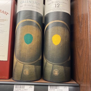 LiquorWellz - two bottles of wine on a shelf - Beer, Wine & Spirits Near Me - Calgary, Alberta