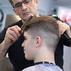 Echelon Academy Beauty - Our stylist, Joseph, cuts one of our regular customers. Loving Martin's new look!
