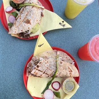Sonoratown - Two "Caramelo" tacos with grilled steak/carne asada and two aguas frescas - Mexican Near Me - Los Angeles, California Sonoratown - Two "Caramelo" tacos with grilled steak/carne asada and two aguas frescas - Mexican Near Me - Los Angeles, California