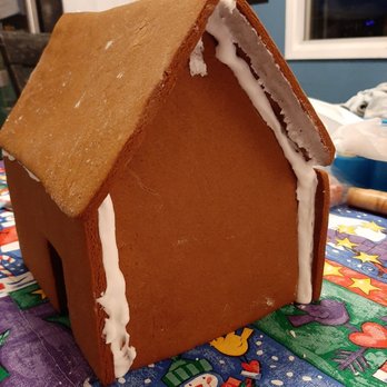 Cake Affair - a gingerbread house on a table - Custom Cakes Near Me - Spruce Grove, Alberta