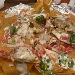 I added tomatos, guac and more Queso to the nachos I added tomatos, guac and more Queso to the nachos