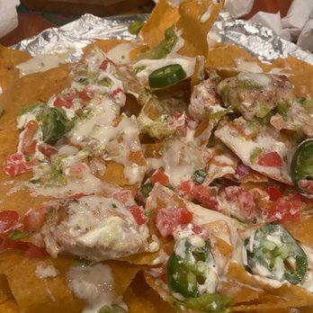 Gator's Dockside Apopka - I added tomatos, guac and more Queso to the nachos - American Near Me - Apopka, Florida Gator's Dockside Apopka - I added tomatos, guac and more Queso to the nachos - American Near Me - Apopka, Florida