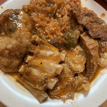 El Palacio Buffet - Meats...lamb ribs, ox tail, pork and stewed eggplant - Latin American Near Me - Orlando, Florida El Palacio Buffet - Meats...lamb ribs, ox tail, pork and stewed eggplant - Latin American Near Me - Orlando, Florida