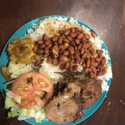 Antojitos Deli - Pork chops white rice beans tostones salad