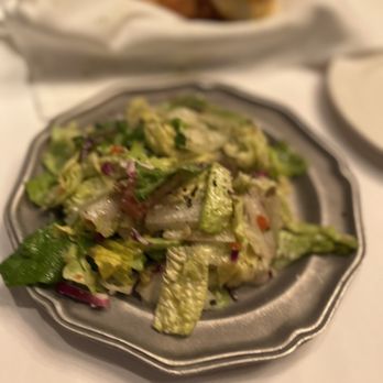 FishBones - a salad on a plate on a table - Sushi Bars Near Me - Lake Mary, Florida FishBones - a salad on a plate on a table - Sushi Bars Near Me - Lake Mary, Florida