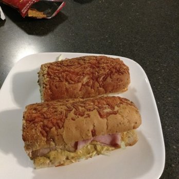 Subway - two sandwiches on a plate on a table - Sandwiches Near Me - Huntsville, Alabama Subway - two sandwiches on a plate on a table - Sandwiches Near Me - Huntsville, Alabama