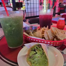 Carne asada taco, chips and salsa, cucumber and mango/jamica agua fresca Carne asada taco, chips and salsa, cucumber and mango/jamica agua fresca