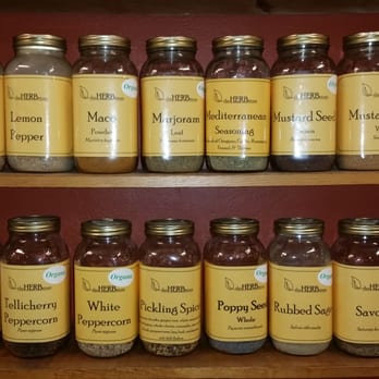 The Herb Store - a shelf full of jars of herbs - Candle Stores Near Me - Albuquerque, New Mexico