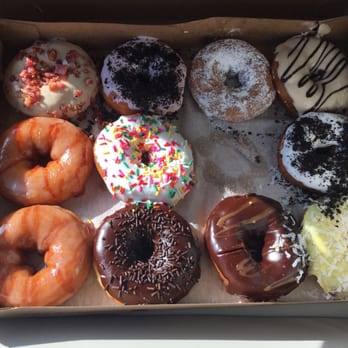 Duck Donuts - A dozen donuts (minus the one I ate because I couldn't wait). - Donuts Near Me - Duck, North Carolina Duck Donuts - A dozen donuts (minus the one I ate because I couldn't wait). - Donuts Near Me - Duck, North Carolina