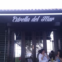Estrella Del Mar - Bajo el toldo de la terraza trasera que da a Playa Jardin de Boiro