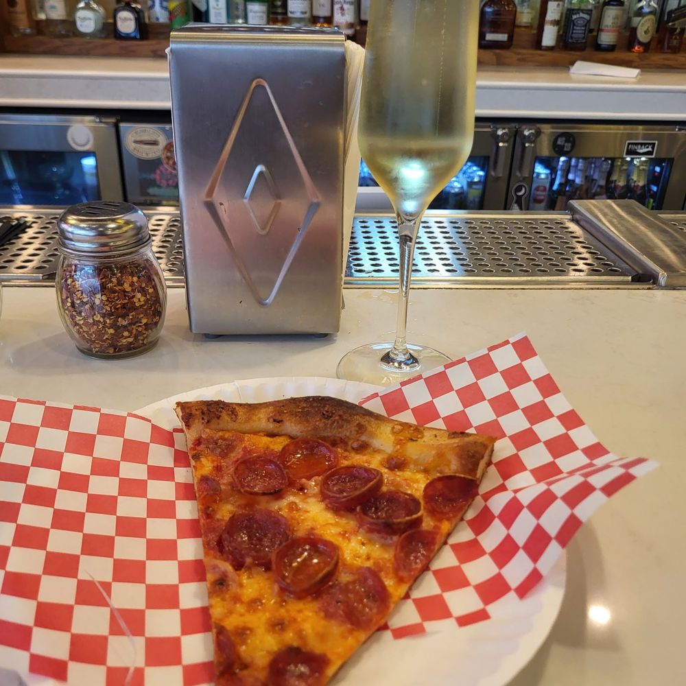Andy’s Pizza - Tysons - Pizza and bubblies - Pizza Near Me - McLean, Virginia Andy’s Pizza - Tysons - Pizza and bubblies - Pizza Near Me - McLean, Virginia
