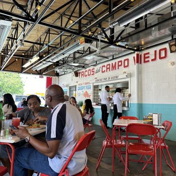 Tacombi - Interior and the kitchen - Tacos Near Me - Westbury, New York