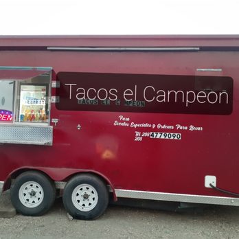 Tacos El Campeon - a taco truck parked in a parking lot - Food Trucks Near Me Tacos El Campeon - a taco truck parked in a parking lot - Food Trucks Near Me