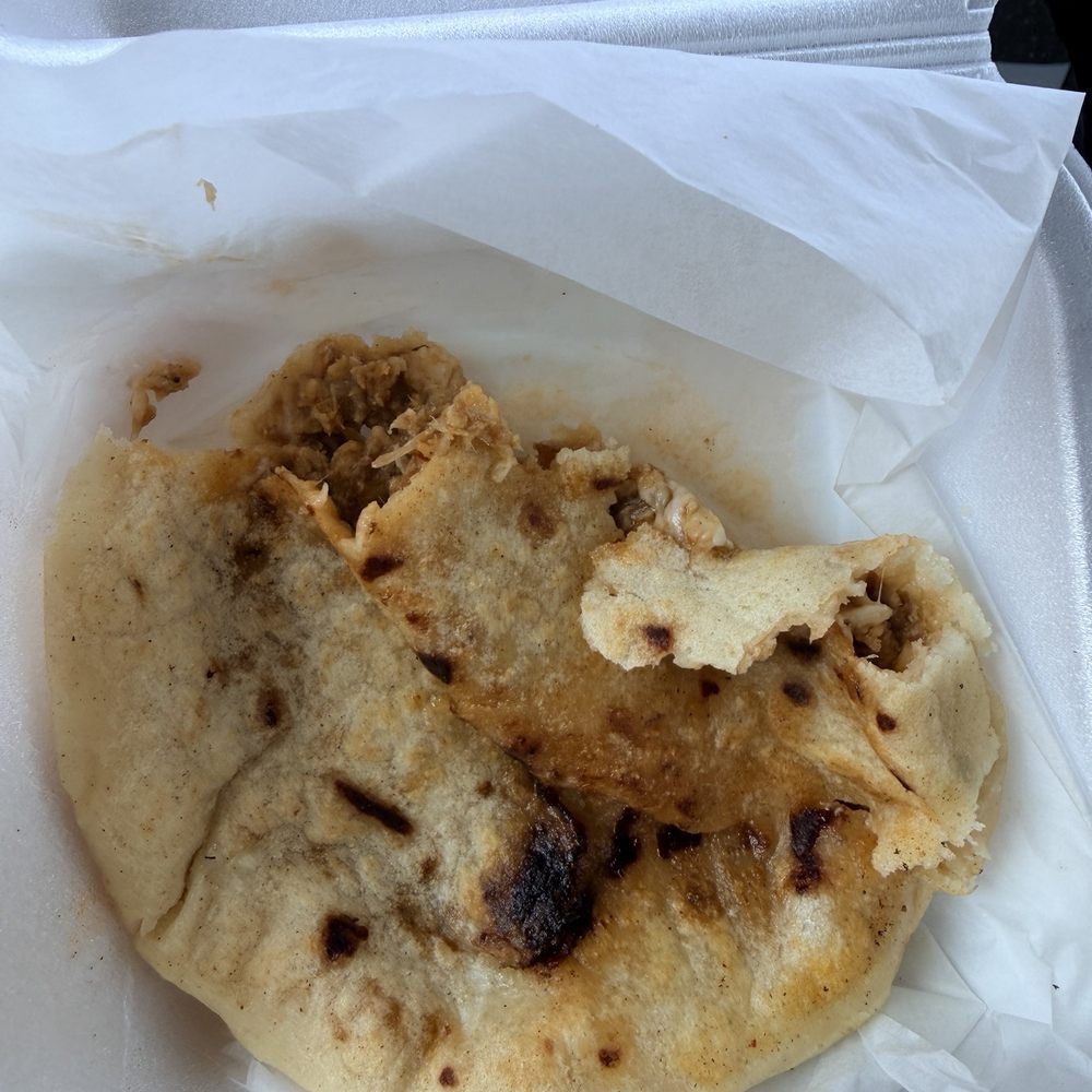 Taco Burrito - Pork & cheese papaya, half eaten - Tacos Near Me - Norfolk, Virginia Taco Burrito - Pork & cheese papaya, half eaten - Tacos Near Me - Norfolk, Virginia