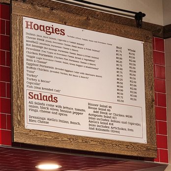 Aiello's Pizza - Hoagies/Salads Menu above counter. - Pizza Near Me - Allison Park, Pennsylvania