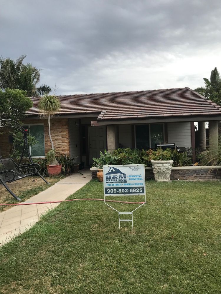 Slide of B & M Roofing