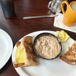 R Place Cafe - #4 eye opener sandwich with the side of gravy with hot sauce added of course and french toast!