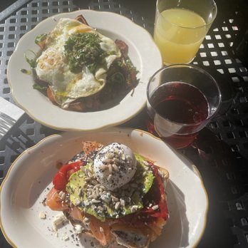 The Essential - Top: The Hash with orange mimosa Bottom: avocado toast with smoked salmon and pomegranate mimosa - Bars Near Me - Birmingham, Alabama The Essential - Top: The Hash with orange mimosa Bottom: avocado toast with smoked salmon and pomegranate mimosa - Bars Near Me - Birmingham, Alabama