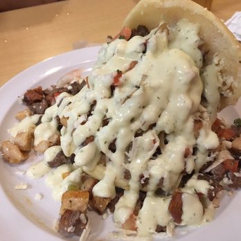 Q'Kenan Restaurant - Arepa Q'kenan Santa Barbara with beef chicken and sausage: delicious - Venezuelan Near Me - Orlando, Florida Q'Kenan Restaurant - Arepa Q'kenan Santa Barbara with beef chicken and sausage: delicious - Venezuelan Near Me - Orlando, Florida