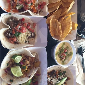 Voodoo Taco - Combination of chips and queso with: alligator taco, lobster taco, and steak fajita taco - Tex-Mex Near Me - Gretna, Nebraska Voodoo Taco - Combination of chips and queso with: alligator taco, lobster taco, and steak fajita taco - Tex-Mex Near Me - Gretna, Nebraska