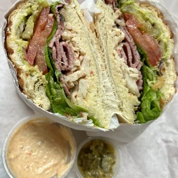 Lou's Cafe - Pastrami and imitation crab salad on Dutch Crunch with Lou's Special Sauce and Jalapeño Spread - Breakfast & Brunch Near Me - San Francisco, California Lou's Cafe - Pastrami and imitation crab salad on Dutch Crunch with Lou's Special Sauce and Jalapeño Spread - Breakfast & Brunch Near Me - San Francisco, California