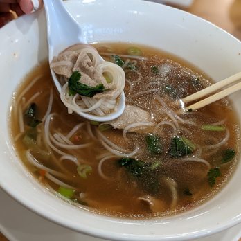 Pho Real 2 - a bowl of soup with noodles and meat - Vietnamese Near Me - Saginaw, Texas