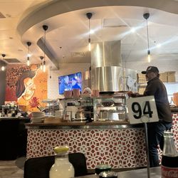 Thunderbolt Pizza - TVs inside right by pizza oven. So awesome