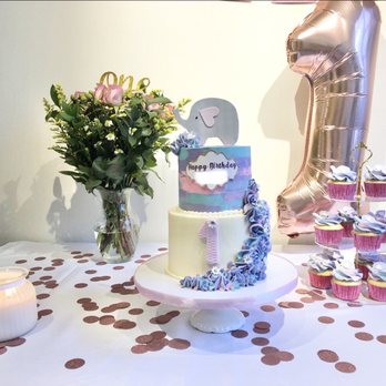 Soma cakes NYC - 2-tier birthday cake and matching dozen cupcakes - Custom Cakes Near Me - New York, New York Soma cakes NYC - 2-tier birthday cake and matching dozen cupcakes - Custom Cakes Near Me - New York, New York