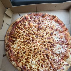 The Pizza Man - Extra cheeeesey light on the sauce large beautiful yummy pizza!