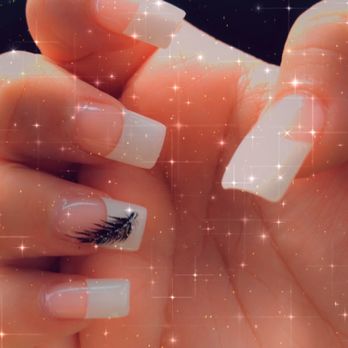 Serenity Nails And Lashes Studio - French tip with a Feather on ring finger - Nail Salons Near Me - Modesto, California Serenity Nails And Lashes Studio - French tip with a Feather on ring finger - Nail Salons Near Me - Modesto, California