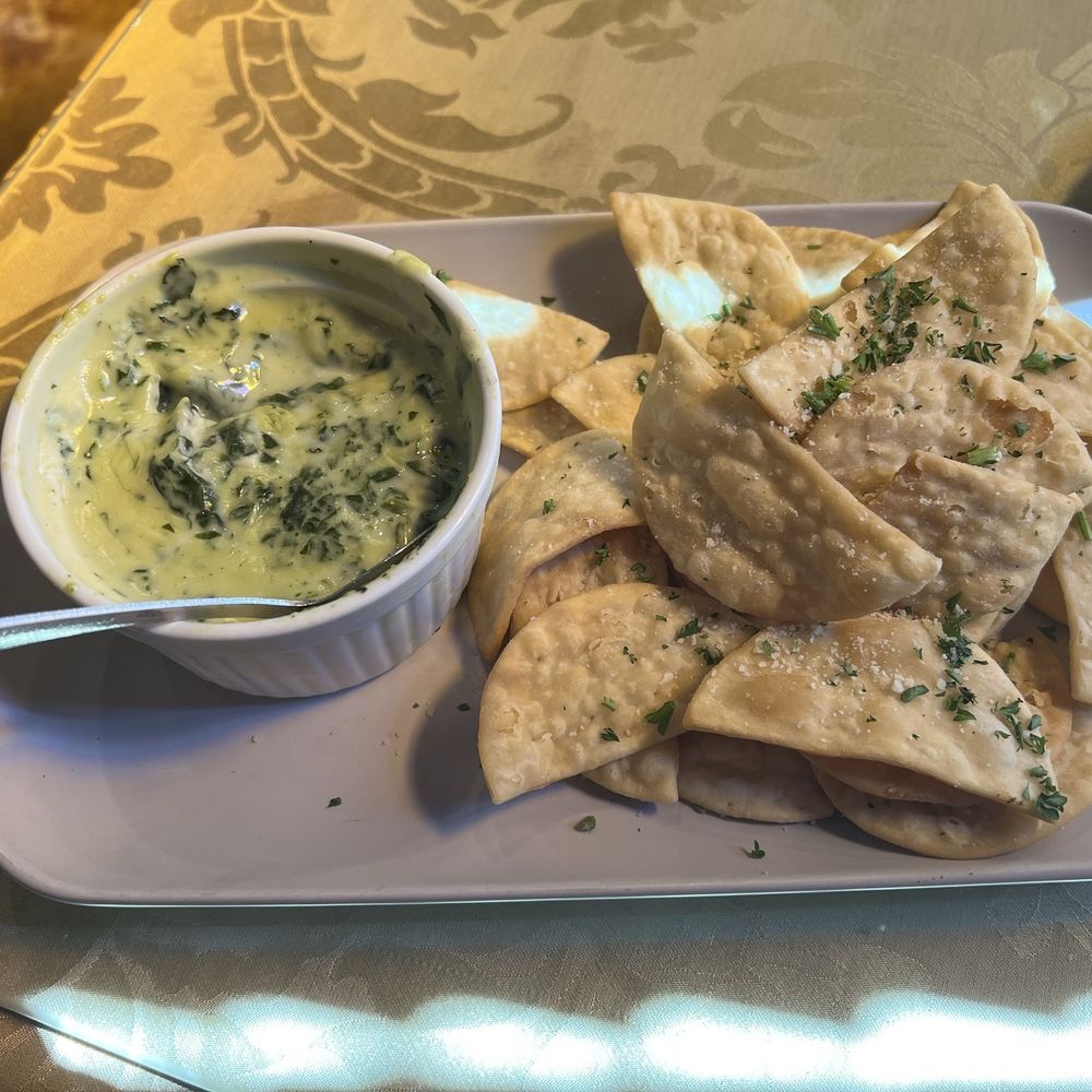 Frank's Place - Spinach and artichoke dip with pita chips - Italian Near Me - Danville, Indiana Frank's Place - Spinach and artichoke dip with pita chips - Italian Near Me - Danville, Indiana
