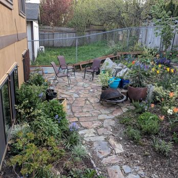 HomeGrown Organics - Path to main patio that opens up. Boulder retaining wall at back right. Thank you HGO! - Landscaping Near Me - Seattle, Washington HomeGrown Organics - Path to main patio that opens up. Boulder retaining wall at back right. Thank you HGO! - Landscaping Near Me - Seattle, Washington