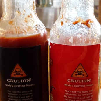 Amigos - Warning on the back of bottles. - Mexican Near Me - Key West, Florida