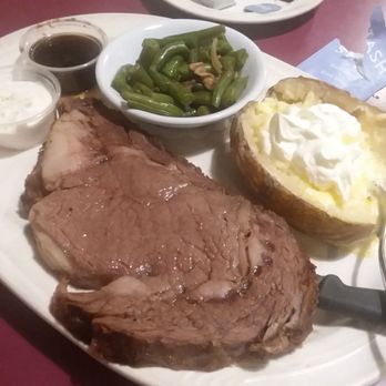 Riley's Restaurant & Lounge - Flavorful prime rib, perfectly cooked baked potato & wonderful green beans with bacon. - American Near Me - Seaside, Oregon Riley's Restaurant & Lounge - Flavorful prime rib, perfectly cooked baked potato & wonderful green beans with bacon. - American Near Me - Seaside, Oregon