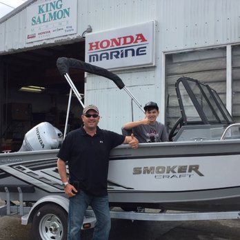 King Salmon Marine - Another happy gentleman and his son on the water!! - Boat Dealers Near Me - Tacoma, Washington King Salmon Marine - Another happy gentleman and his son on the water!! - Boat Dealers Near Me - Tacoma, Washington