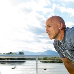 Jamie Solorio Photography - Healthy man cooling down after his long run on the Sundial Bridge of Redding, CA over the Sacramento River.  -Jamie Solorio