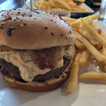 My girlfriend's chicken sandwich with my burger. Great fries too.