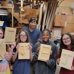 The Wood Work Shop - The girls really put their new skills to work. Sketching, measuring, cutting each piece with multiple types of saws, sanding and nailing.