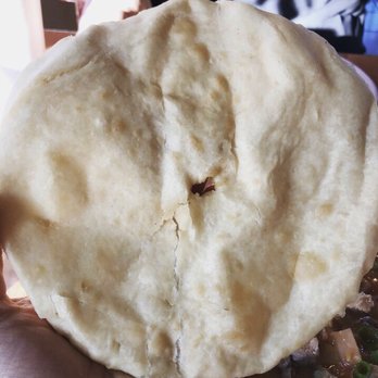 New Mexican Grill - piping hot Indian fry bread that comes with the green chile stew. absolutely divine - New Mexican Cuisine Near Me - Gilbert, Arizona New Mexican Grill - piping hot Indian fry bread that comes with the green chile stew. absolutely divine - New Mexican Cuisine Near Me - Gilbert, Arizona