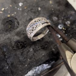 Nory's Fashion Jewelry & Watch Repair - Ring size up