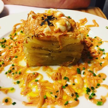 Palo Cortao - Potatoes with poached egg and bits of foie. - Tapas Bars Near Me - Barcelona, B