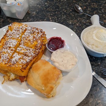 Texan Diner - Monte Cristo Sandwich with a side of grits. I added on a side of biscuit and gravy. - Breakfast & Brunch Near Me - Haslet, Texas Texan Diner - Monte Cristo Sandwich with a side of grits. I added on a side of biscuit and gravy. - Breakfast & Brunch Near Me - Haslet, Texas