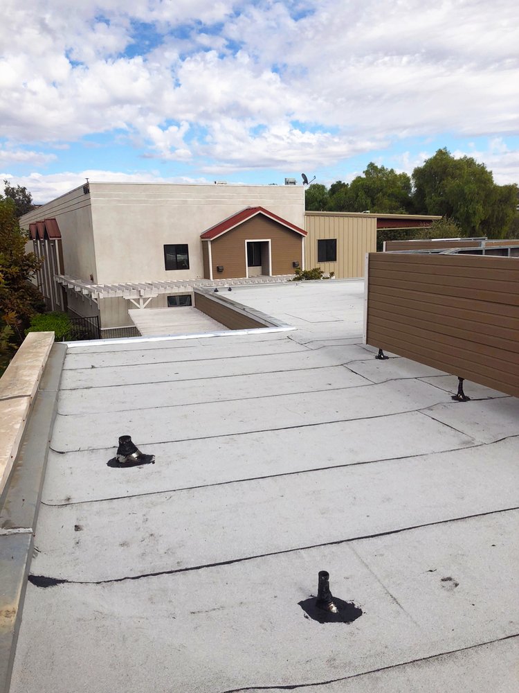 Slide of Ruiz Roofing