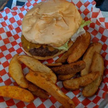 Fuddruckers - Ostrich Burger with seasoned wedges - Burgers Near Me - Concord, California Fuddruckers - Ostrich Burger with seasoned wedges - Burgers Near Me - Concord, California